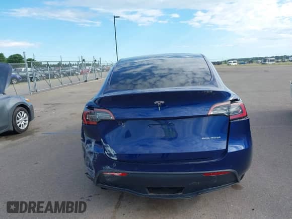 2021 Tesla Model Y Long Range with VIN 5YJYGDEE8MF187196, listed as a IAAI auction lot 42615790 with 89,810 mi miles and . Bid and sale history available at DreamBid. Image 15.