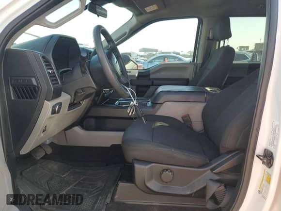 2020 Ford F-150 XL with VIN 1FTEW1CPXLFA15710, listed as a Copart auction lot 61944055 with 98,561 mi miles and Salvage title. Bid and sale history available at DreamBid. Image 7.