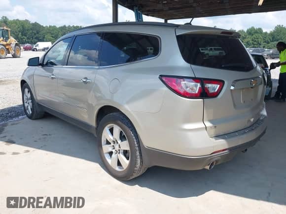 2014 Chevrolet Traverse LTZ with VIN 1GNKVJKD8EJ158689, listed as a IAAI auction lot 43038655 with 215,382 mi miles and . Bid and sale history available at DreamBid. Image 3.