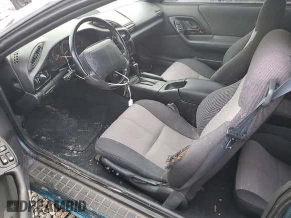 1994 Chevrolet Camaro Z28 z VIN 2G1FP22P3R2127759, wystawiony jako Copart lot #83844354 z przebiegiem 114 607 mil mil oraz Szkoda całkowita • Salvage title. Historia ofert i sprzedaży dostępna na DreamBid. Obrazek 7.