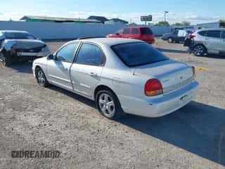 2001 Hyundai Sonata with VIN KMHWF25S41A403128, listed as a IAAI auction lot 43554850 with 212,602 mi miles and . Bid and sale history available at DreamBid. Image 3.