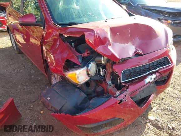 2012 Chevrolet Sonic LT with VIN 1G1JC5SHXC4134144, listed as a IAAI auction lot 43065797 with 121,707 mi miles and . Bid and sale history available at DreamBid. Image 6.