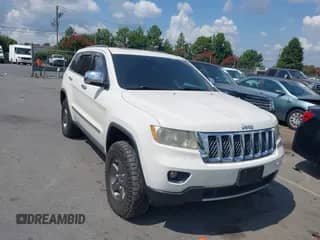 2012 Jeep Grand Cherokee Overland with VIN 1C4RJFCT1CC171419, listed as a IAAI auction lot 42824161 with 172,345 mi miles and . Bid and sale history available at DreamBid. Image 1.