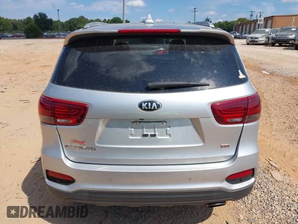 2019 Kia Sorento LX z VIN 5XYPGDA34KG437524, wystawiony jako IAAI lot #43227964 z przebiegiem 124 831 mil mil oraz . Historia ofert i sprzedaży dostępna na DreamBid. Obrazek 16.