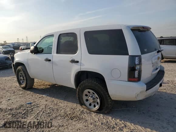 2012 Chevrolet Tahoe Commercial with VIN 1GNSK2E06CR282384, listed as a Copart auction lot 52477755 with 149,915 mi miles and Salvage title. Bid and sale history available at DreamBid. Image 2.