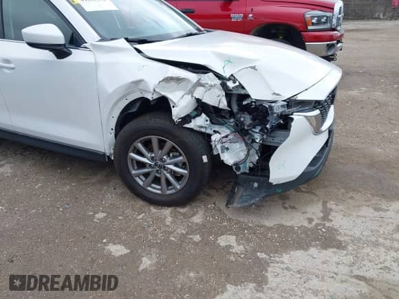 2023 Mazda CX-5 S Carbon Edition z VIN JM3KFBCM8P0187510, wystawiony jako IAAI lot #42628848 z przebiegiem 42 972 mil mil oraz . Historia ofert i sprzedaży dostępna na DreamBid. Obrazek 6.