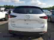 2022 Mazda CX-5 S Preferred z VIN JM3KFBCM6N0558421, wystawiony jako Copart lot #70299535 z przebiegiem 59 737 mil mil oraz Szkoda całkowita • Salvage title. Historia ofert i sprzedaży dostępna na DreamBid. Obrazek 6.