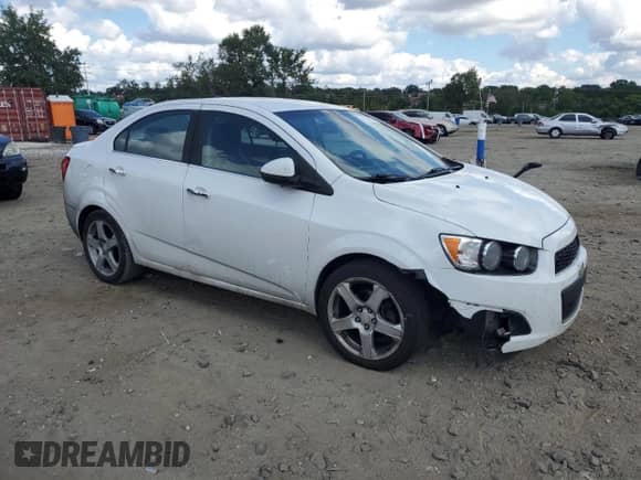 2013 Chevrolet Sonic LTZ with VIN 1G1JE5SG4D4172679, listed as a Copart auction lot 71161245 with 158,691 mi miles and Salvage title. Bid and sale history available at DreamBid. Image 4.
