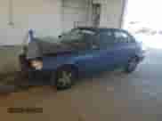 2000 Hyundai Accent z VIN KMHCG45G6YU066218, wystawiony jako Copart lot #84948715 z przebiegiem 110 059 mil mil oraz Szkoda całkowita • Salvage title. Historia ofert i sprzedaży dostępna na DreamBid. Obrazek 1.