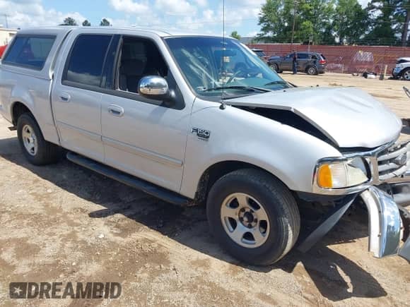 2002 Ford F-150 XLT with VIN 1FTRW07602KB73444, listed as a IAAI auction lot 42744286 with 208,152 mi miles and . Bid and sale history available at DreamBid. Image 1.