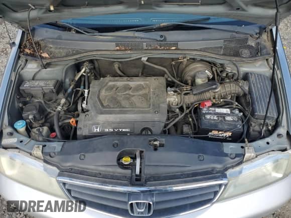 2001 Honda Odyssey LX с VIN 2HKRL18531H540774, выставлен на аукционе Copart как лот 57670255 с пробегом 209 379 миль миль и Списание • Salvage title. История ставок и продаж доступна на DreamBid. Изображение 12.