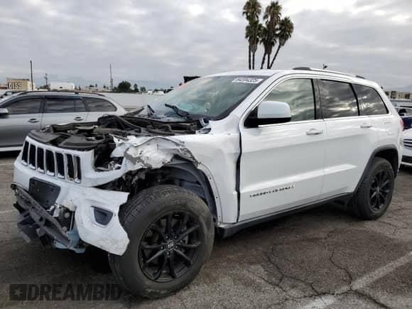 2014 Jeep Grand Cherokee Laredo with VIN 1C4RJEAG4EC265653, listed as a Copart auction lot 84594325 with Not provided miles and Salvage title. Bid and sale history available at DreamBid. Image 1.