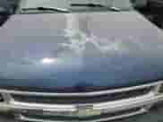 2000 Chevrolet Suburban LT z VIN 3GNFK16T8YG122177, wystawiony jako Copart lot #51071145 z przebiegiem 320 053 mil mil oraz Szkoda całkowita • Salvage title. Historia ofert i sprzedaży dostępna na DreamBid. Obrazek 12.