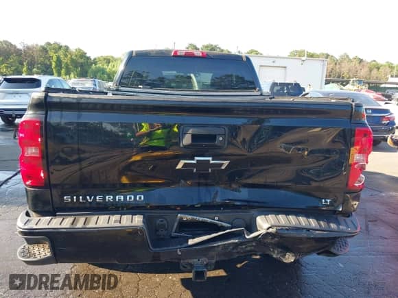 2015 Chevrolet Silverado 1500 LT with VIN 1GCVKREC1FZ332881, listed as a IAAI auction lot 42744439 with 124,409 mi miles and . Bid and sale history available at DreamBid. Image 16.