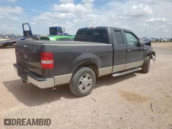 2007 Ford F-150 STX with VIN 1FTRX12W47FB43650, listed as a Copart auction lot 69593435 with 231,578 mi miles and Salvage title. Bid and sale history available at DreamBid. Image 3.