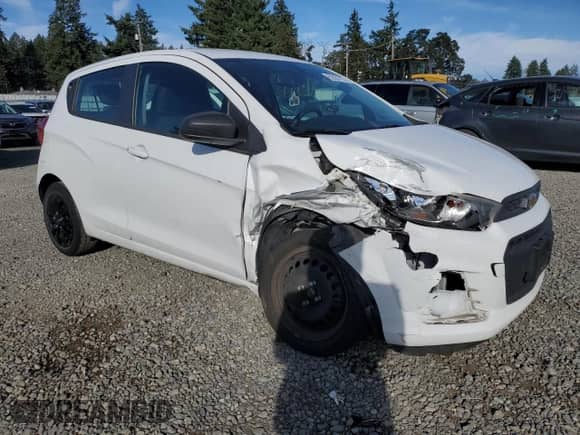2016 Chevrolet Spark LS with VIN KL8CB6SAXGC585221, listed as a Copart auction lot 82557205 with 65,674 mi miles and Salvage title. Bid and sale history available at DreamBid. Image 4.