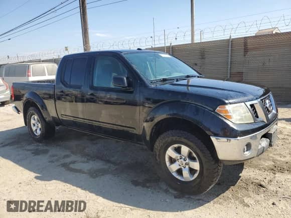 2011 Nissan Frontier SV z VIN 1N6AD0FV5BC438961, wystawiony jako Copart lot #80761545 z przebiegiem 238 831 mil mil oraz Czysty tytuł • Clean title. Historia ofert i sprzedaży dostępna na DreamBid. Obrazek 4.