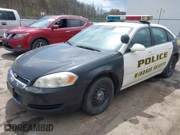 2006 Chevrolet Impala Police Police z VIN 2G1WS551769419411, wystawiony jako IAAI lot #42013349 z przebiegiem 100 587 mil mil oraz . Historia ofert i sprzedaży dostępna na DreamBid. Obrazek 18.