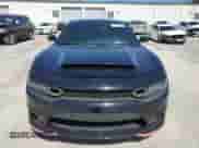 2014 Dodge Charger Road/Track with VIN 2C3CDXCT4EH123937, listed as a Copart auction lot 48771075 with 198,624 mi miles and Salvage title. Bid and sale history available at DreamBid. Image 5.