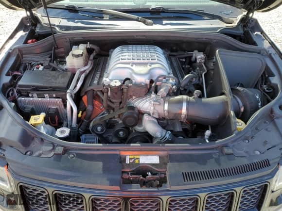 2019 Jeep Grand Cherokee Trackhawk z VIN 1C4RJFN90KC562724, wystawiony jako Copart lot #48701164 z przebiegiem 19 420 mil mil oraz Szkoda całkowita • Salvage title. Historia ofert i sprzedaży dostępna na DreamBid. Obrazek 11.