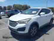 2013 Hyundai Santa Fe Sport with VIN 5XYZTDLB9DG041326, listed as a IAAI auction lot 42261850 with 147,697 mi miles and . Bid and sale history available at DreamBid. Image 2.