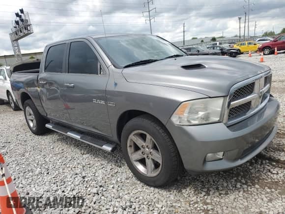 2010 Dodge 1500 SLT z VIN 1D7RV1CT5AS177661, wystawiony jako Copart lot #56820115 z przebiegiem 124 286 mil mil oraz Szkoda całkowita • Salvage title. Historia ofert i sprzedaży dostępna na DreamBid. Obrazek 4.