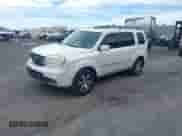 2013 Honda Pilot Touring with VIN 5FNYF4H95DB077773, listed as a IAAI auction lot 43046082 with 121,441 mi miles and . Bid and sale history available at DreamBid. Image 2.