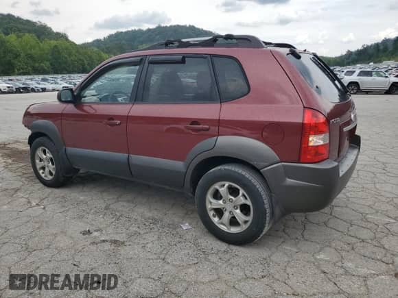 2009 Hyundai Tucson SE with VIN KM8JN12D79U941281, listed as a Copart auction lot 67221365 with 142,585 mi miles and Salvage title. Bid and sale history available at DreamBid. Image 2.