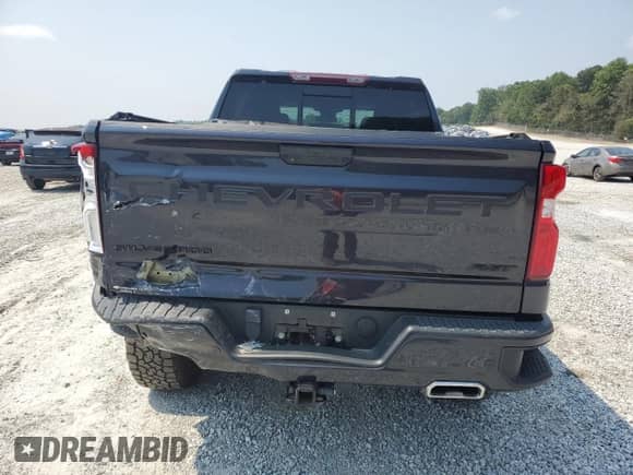 2022 Chevrolet Silverado 1500 RST with VIN 3GCUDEET3NG662986, listed as a Copart auction lot 59013585 with 26,141 mi miles and Salvage title. Bid and sale history available at DreamBid. Image 6.