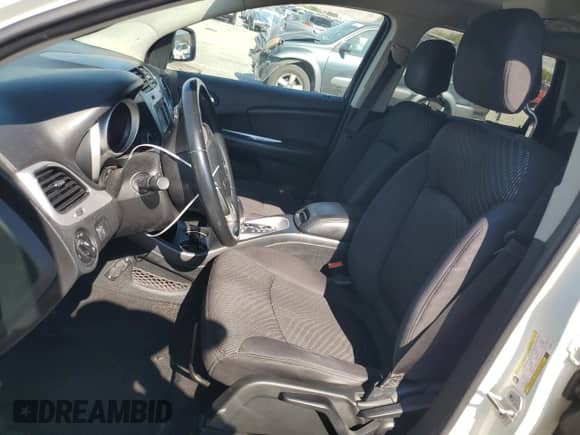 2014 Dodge Journey SXT with VIN 3C4PDCBB7ET119077, listed as a Copart auction lot 68337365 with 99,909 mi miles and Salvage title. Bid and sale history available at DreamBid. Image 7.
