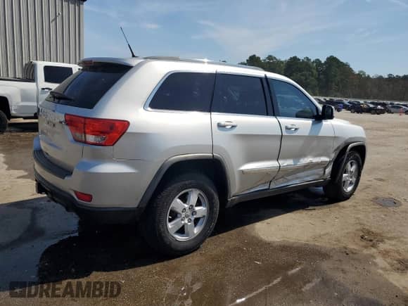 2011 Jeep Grand Cherokee 70th Anniversary z VIN 1J4RR4GG0BC508200, wystawiony jako Copart lot #80286225 z przebiegiem 219 332 mil mil oraz Szkoda całkowita • Salvage title. Historia ofert i sprzedaży dostępna na DreamBid. Obrazek 3.