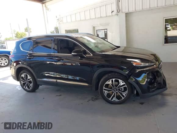 2019 Hyundai Santa Fe Ultimate с VIN 5NMS53AA1KH048788, выставлен на аукционе IAAI как лот 42822096 с пробегом 71 075 миль миль и . История ставок и продаж доступна на DreamBid. Изображение 13.