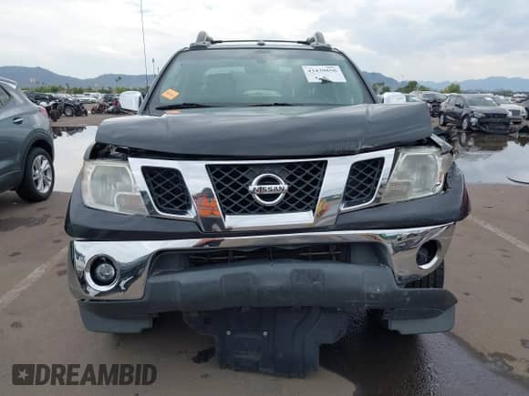 2012 Nissan Frontier SV with VIN 1N6AD0ER0CC437609, listed as a IAAI auction lot 43439850 with 165,136 mi miles and . Bid and sale history available at DreamBid. Image 6.