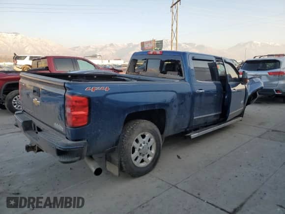 2015 Chevrolet Silverado 3500HD High Country с VIN 1GC4K1E85FF599564, выставлен на аукционе Copart как лот 83103914 с пробегом Не указан миль и Списание • Salvage title. История ставок и продаж доступна на DreamBid. Изображение 3.