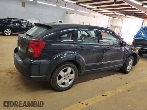 2008 Dodge Caliber SXT с VIN 1B3HB48CX8D665433, выставлен на аукционе Copart как лот 47119435 с пробегом 206 027 миль миль и Списание • Salvage title. История ставок и продаж доступна на DreamBid. Изображение 3.