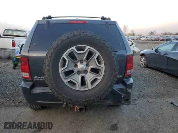 2008 Jeep Grand Cherokee Laredo z VIN 1J8HR48M98C185305, wystawiony jako Copart lot #83466944 z przebiegiem 166 769 mil mil oraz Czysty tytuł • Clean title. Historia ofert i sprzedaży dostępna na DreamBid. Obrazek 6.