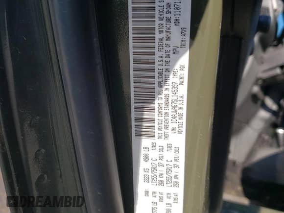 2016 Jeep Wrangler Willys Wheeler with VIN 1C4AJWAG7GL145397, listed as a Copart auction lot 66520875 with 57,431 mi miles and Salvage title. Bid and sale history available at DreamBid. Image 13.