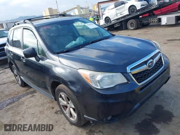 2014 Subaru Forester Premium with VIN JF2SJAEC4EH498762, listed as a IAAI auction lot 41442423 with 228,769 mi miles and . Bid and sale history available at DreamBid. Image 1.