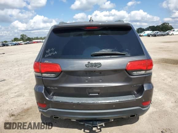 2014 Jeep Grand Cherokee Limited with VIN 1C4RJFBG2EC425758, listed as a Copart auction lot 84218625 with 157,919 mi miles and Salvage title. Bid and sale history available at DreamBid. Image 6.