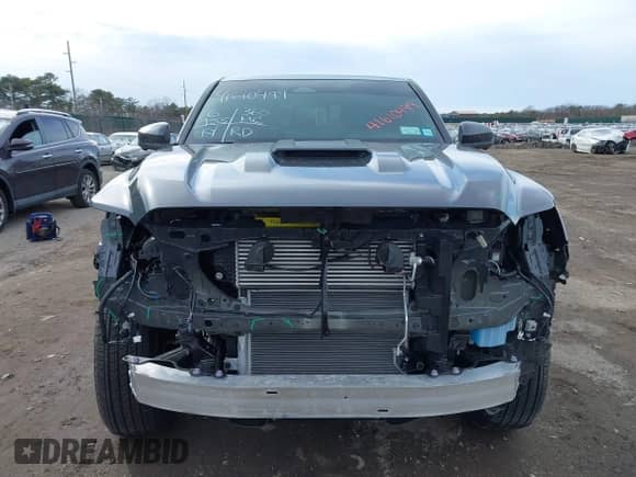 2024 Toyota Tacoma SR5 with VIN 3TYLB5JN1RT039046, listed as a IAAI auction lot 41610499 with 6,455 mi miles and . Bid and sale history available at DreamBid. Image 13.