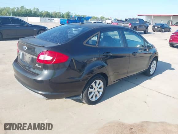 2011 Ford Fiesta SE z VIN 3FADP4BJ7BM108874, wystawiony jako IAAI lot #43137504 z przebiegiem 144 354 mil mil oraz . Historia ofert i sprzedaży dostępna na DreamBid. Obrazek 4.