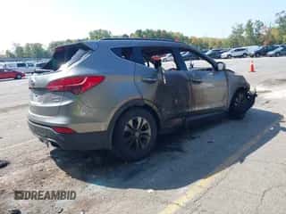 2014 Hyundai Santa Fe with VIN 5XYZUDLBXEG185949, listed as a IAAI auction lot 43249188 with Not provided miles and . Bid and sale history available at DreamBid. Image 4.