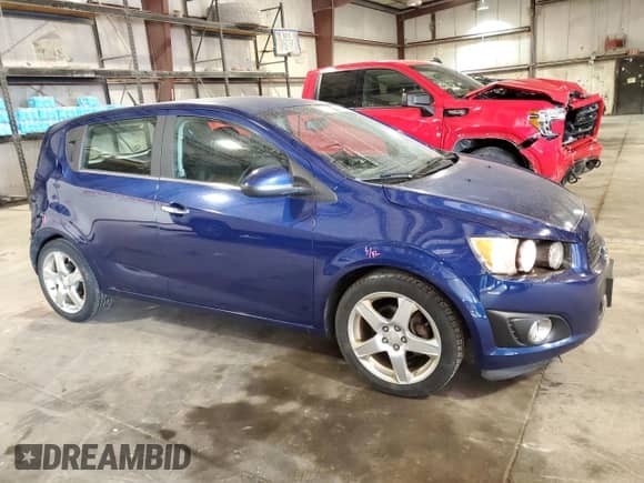 2014 Chevrolet Sonic LTZ с VIN 1G1JE6SB1E4111883, выставлен на аукционе Copart как лот 56010855 с пробегом 147 745 миль миль и Списание • Salvage title. История ставок и продаж доступна на DreamBid. Изображение 4.