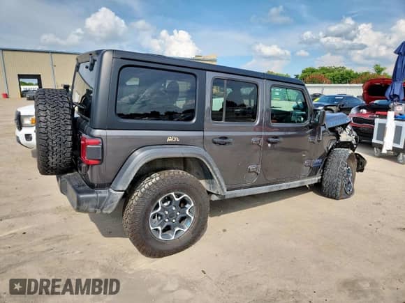 2023 Jeep Wrangler Rubicon с VIN 1C4JJXR67PW698583, выставлен на аукционе Copart как лот 64409575 с пробегом 44 739 миль миль и Списание • Salvage title. История ставок и продаж доступна на DreamBid. Изображение 3.