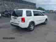 2013 Honda Pilot Touring with VIN 5FNYF4H95DB077773, listed as a IAAI auction lot 43046082 with 121,441 mi miles and . Bid and sale history available at DreamBid. Image 6.