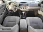 2004 Toyota Camry LE with VIN 4T1BF32K14U586371, listed as a Copart auction lot 82438215 with 196,999 mi miles and Salvage title. Bid and sale history available at DreamBid. Image 8.