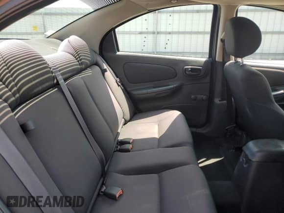 2004 Dodge Neon SE z VIN 1B3ES26C74D533797, wystawiony jako Copart lot #69045084 z przebiegiem 105 561 mil mil oraz Szkoda całkowita • Salvage title. Historia ofert i sprzedaży dostępna na DreamBid. Obrazek 10.