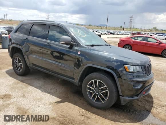 2019 Jeep Grand Cherokee Trailhawk with VIN 1C4RJFLG0KC655910, listed as a Copart auction lot 63320195 with 93,639 mi miles and Salvage title. Bid and sale history available at DreamBid. Image 4.
