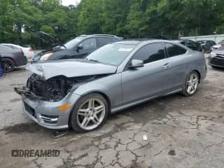 2014 Mercedes-Benz C 250 with VIN WDDGJ4HB9EG195786, listed as a Copart auction lot 57779475 with Not provided miles and Salvage title. Bid and sale history available at DreamBid. Image 1.
