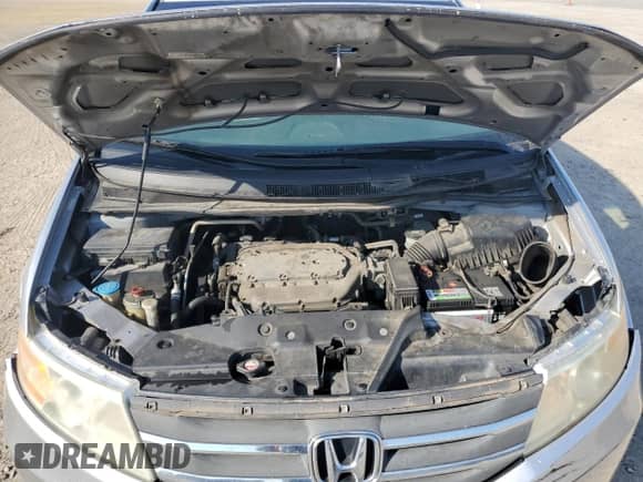 2012 Honda Odyssey LX with VIN 5FNRL5H20CB049254, listed as a Copart auction lot 82322145 with 197,270 mi miles and Salvage title. Bid and sale history available at DreamBid. Image 12.